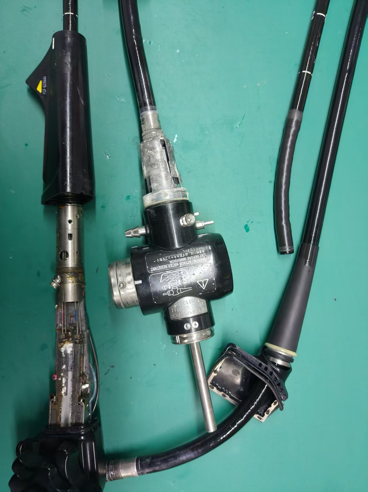 奥林巴斯Q260AI镜体进水图像花屏、手柄机板生锈维修